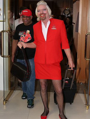 Richard Branson to serve Air Asia passengers and clean toilets